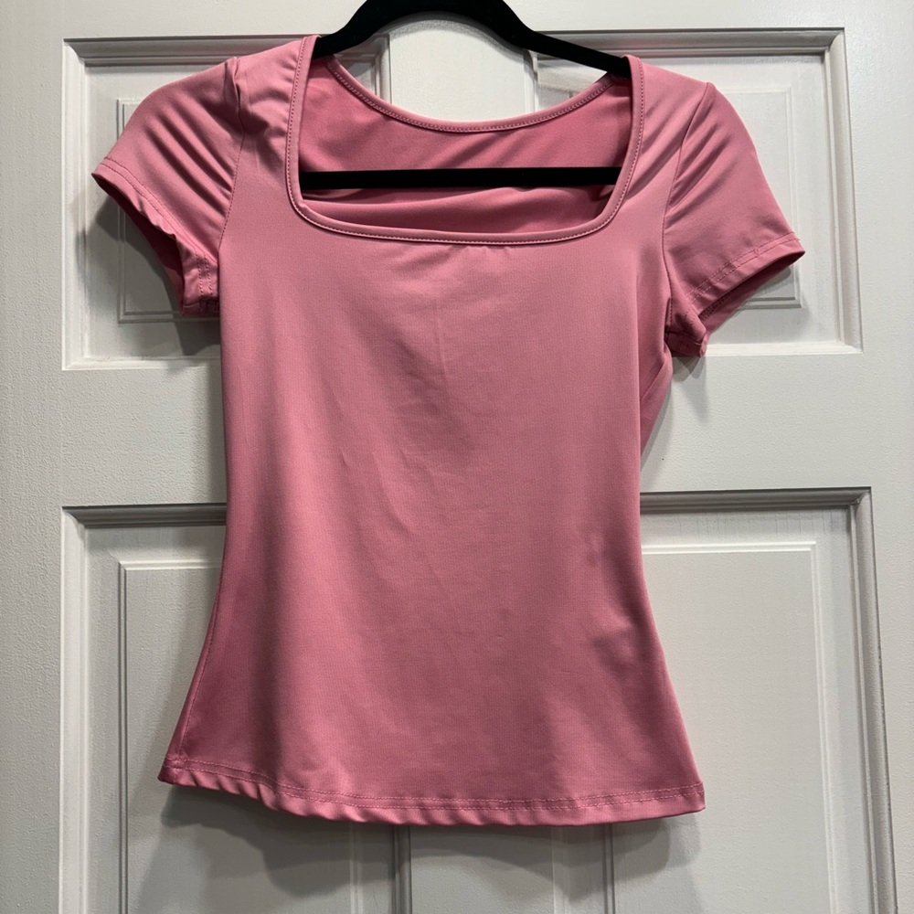 Pink shirt with a square neck